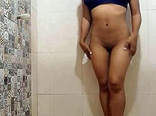 An attractive, 18 year old enjoys a steamy shower with a rich man
