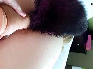 Wife takes a dildo to my cock