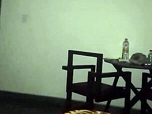 A hotel room where three people are makin loud noises