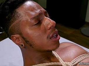 Busty asian domme torments black guy with strapon 😈