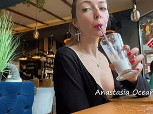 A pinup amateur girl flashes public cafe