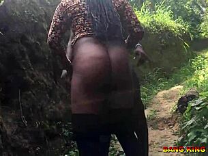 On a tourism trip, an African American adult film star gets down and dirty with a local hunter's wife